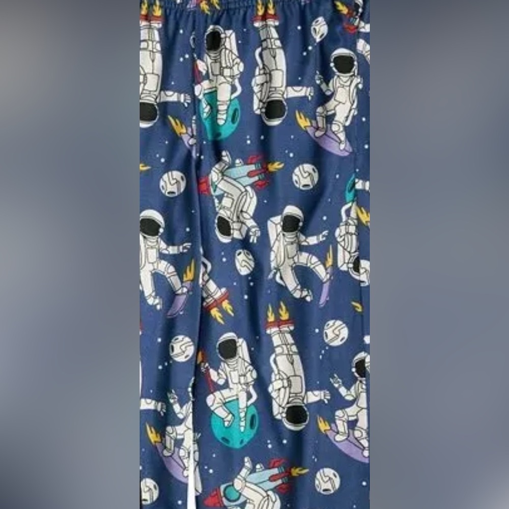 Space themed two-piece pajama set from Sonoma. size XL boys